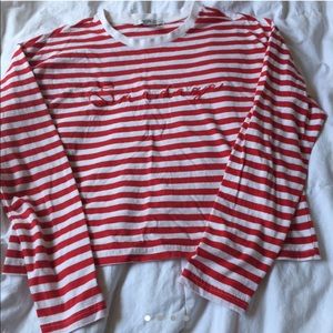 Red and white striped long sleeve crop top